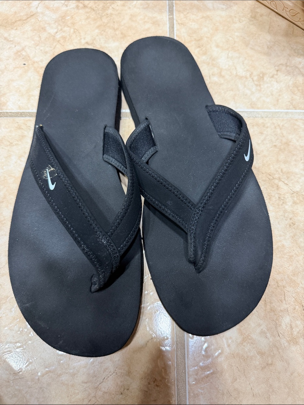 Nike black flip flops for women